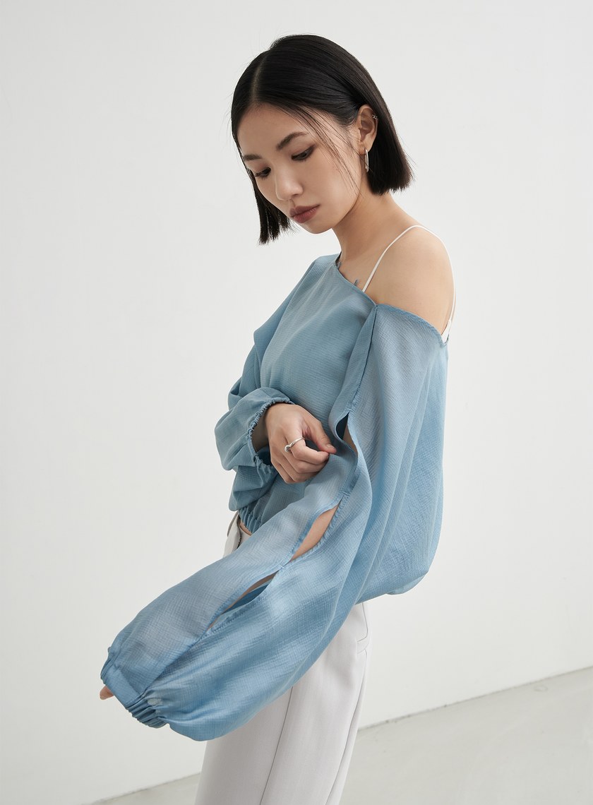 親膚簍空細節長袖上衣