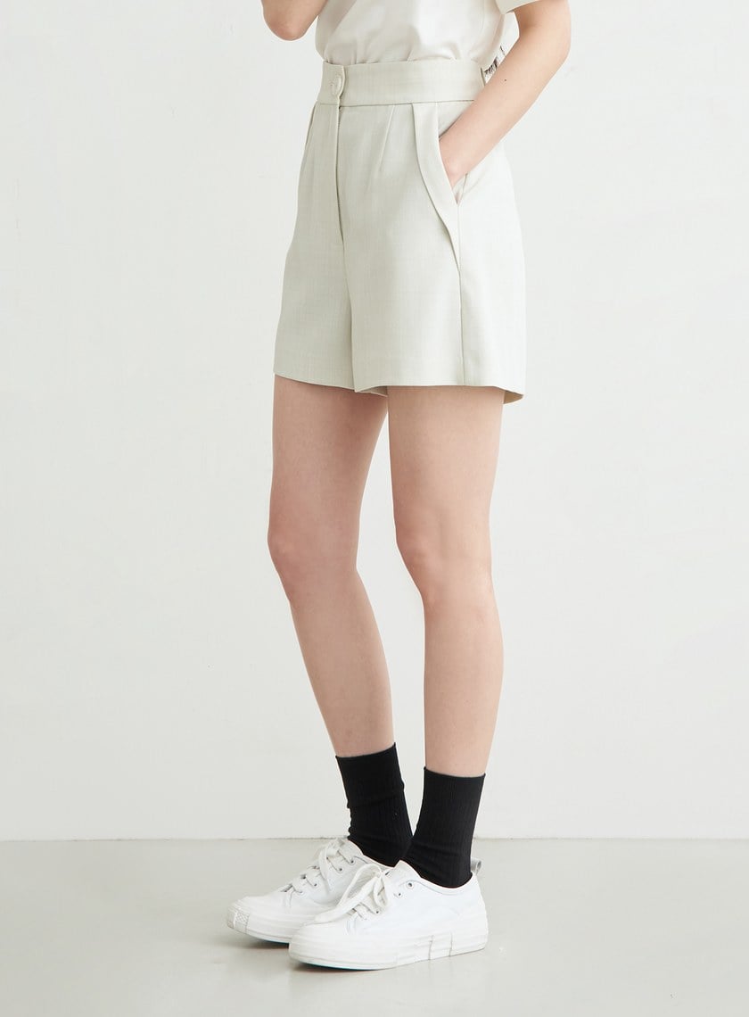 提織反摺斜袋細節短褲