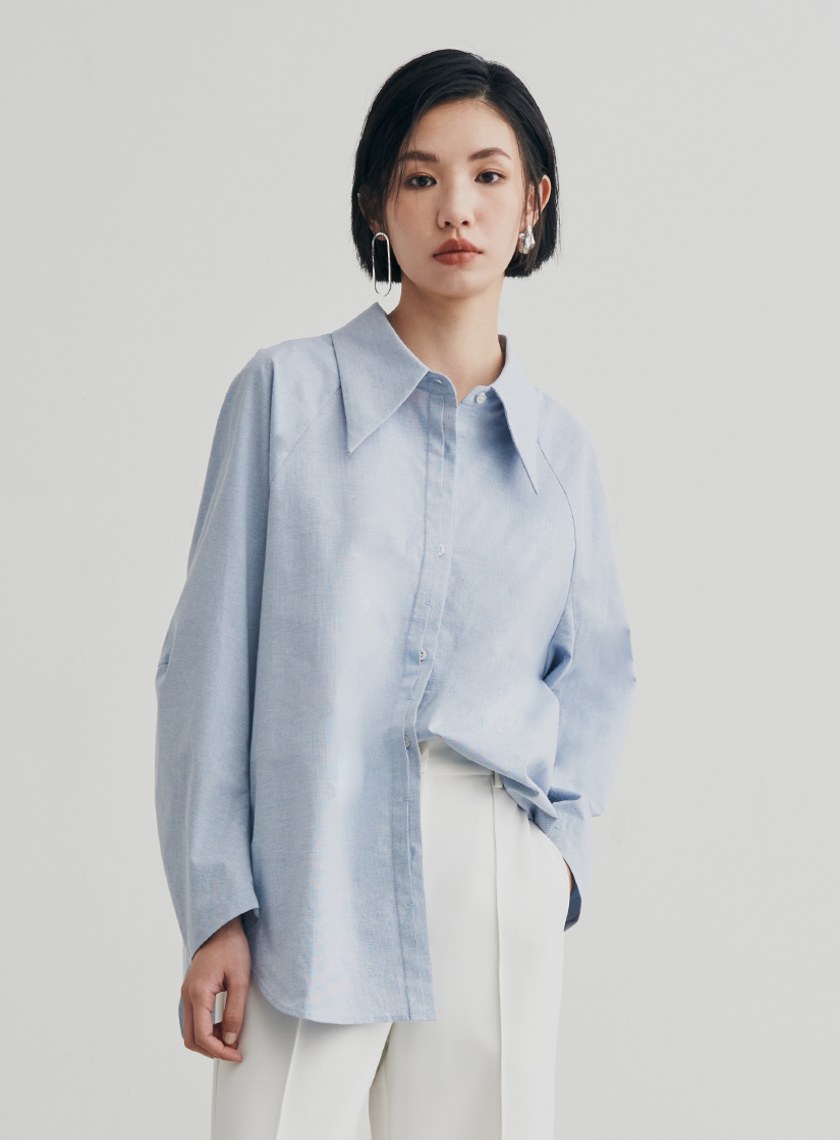 尖領簍空細節廓型襯衫