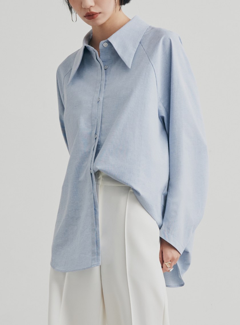 尖領簍空細節廓型襯衫