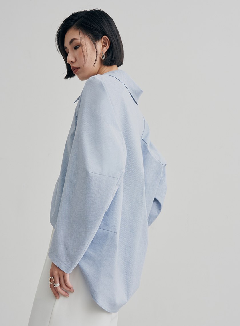 尖領簍空細節廓型襯衫
