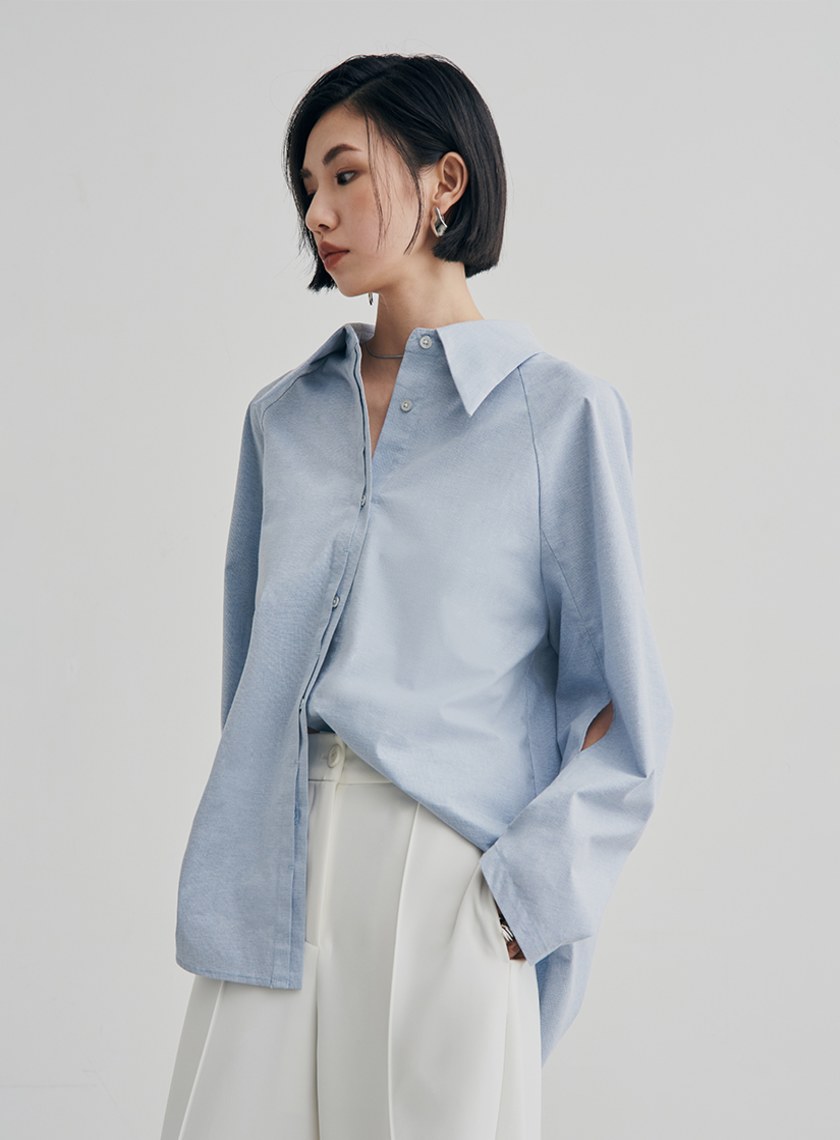 尖領簍空細節廓型襯衫