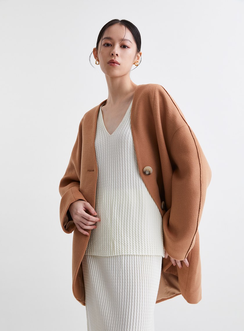 溫柔簡約V領緹花針織上衣