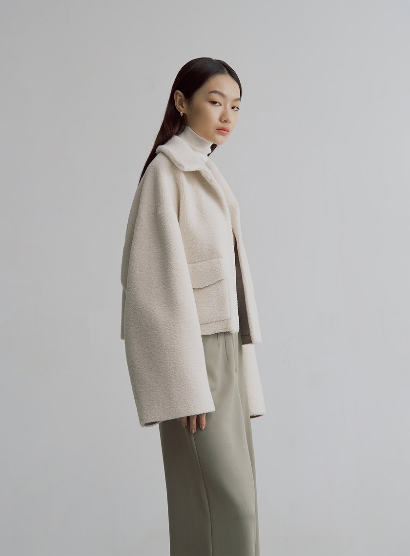 毛絨口袋造型短版外套