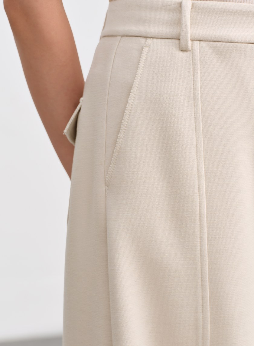 挺廓感休閒彎刀褲