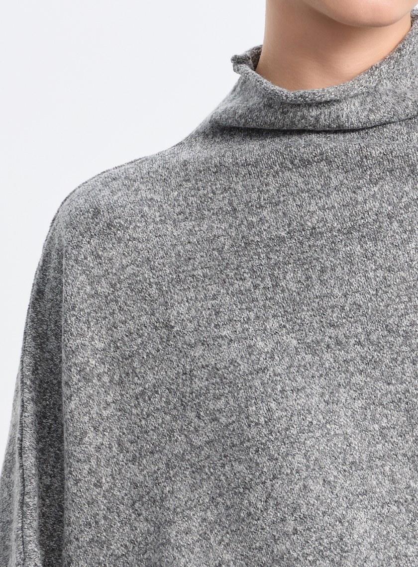 半高領落肩不對稱上衣