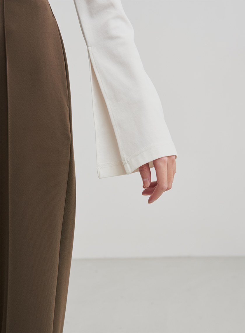 不對稱領開衩長袖上衣