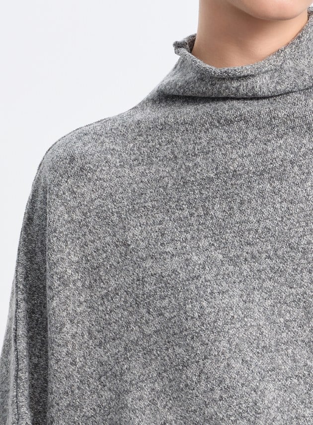 半高領落肩不對稱上衣