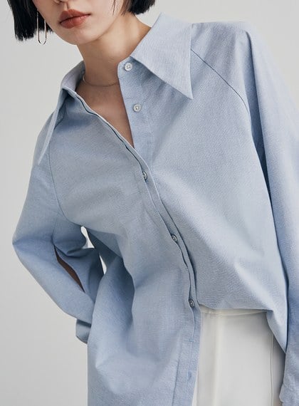 尖領簍空細節廓型襯衫