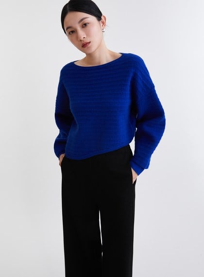 不規則造型立體織紋針織上衣