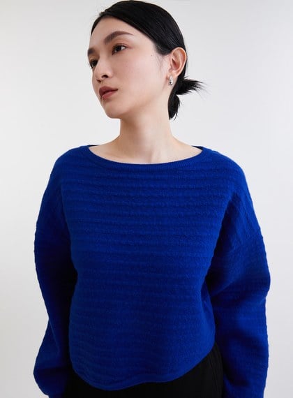 不規則造型立體織紋針織上衣