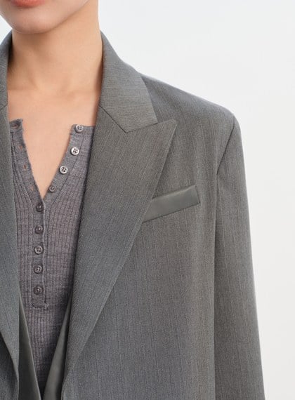 俐落假兩件拼接西裝外套