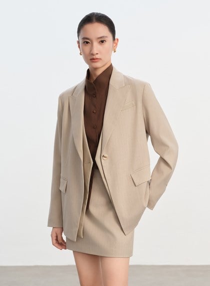 俐落假兩件拼接西裝外套